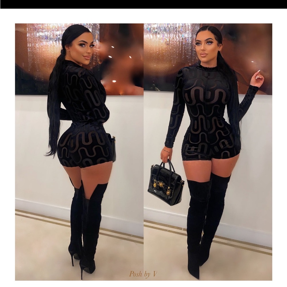 Black velvet romper never been worn .  Selling because it  doesn’t fit